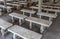 Picturesque rows of white stone benches perfectly aligned