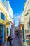 Picturesque Santorini narrow commercial street in Fira Cyclades Greece