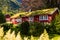 Picturesque scene of Urke village and Hjorundfjorden fjord, Norway. Drammatic sky and gloomy mountains. Landscape