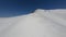 Picturesque sharp mountain summit covered by snow surrounded by cinematic white clear winter