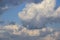 Picturesque sky with thunderstorms cumulus clouds. Blue sky with big clouds. Air clouds background. Copy space.