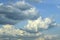 Picturesque sky with thunderstorms cumulus clouds. Overcast sky with big clouds. Air clouds background. Copy space.