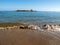 Picturesque small Chapel on island across Malia beach, Crete