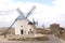 Picturesque Spanish windmills and Don Quichot statue in Consuegra,Spain