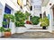 Picturesque street decorated with plants, in Andalusia