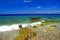 Picturesque summer beach, pebbles in the clear transparent water, Rhodes, Greece, Blue flag beach, island for travel