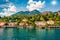 Picturesque summer view from ferry boat of Cadenabbia town. Bright morning scene of Como lake, Italy, Europe. Traveling concept ba