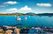 Picturesque summer view of Nuevo Loca Beach. Bright morning seascape of the Aegean sea, Palaia Fokaia location, Greece, Europe. Tr