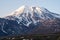 Picturesque summer volcanic landscape of Kamchatka Peninsula: view of active Volcano.