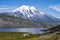 Picturesque summer volcanic landscape of Kamchatka Peninsula: view of active Volcano.