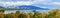 Picturesque Te Anau lake and blue mountains panorama, New Zealand