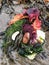 Picturesque tidal beach find with colourful seaweed, kelp