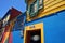 Picturesque town of Caminito with typical houses tourist place in La Boca figures Gardel Evita Buenos Aires Argentina