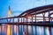 Picturesque underneath view of highway interchange and suspension bridges at dusk