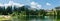 The picturesque Untersee lake in Arosa with the public swimming pool and a great mountain view