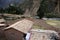 picturesque valley with clear water river mountains and cereal harvest trees and sky in huancavelica peru