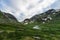 Picturesque valley between snowy rocks