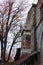 Picturesque view of ancient building with old wooden balcony. Street in Istanbul, Turkey. Winter landscape view