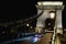 Picturesque view of ancient illuminated Chain Bridge over Danube river. Notable landmark of Budapest