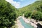 Picturesque view of blue river surrounded by rocks