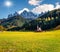 Picturesque view of Chiesetta di San Giovanni in Ranui church in front of the Geisler or Odle Dolomites Group. Colorful autumn