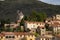 Picturesque view of Cucugnan commune with main landmark 17th-century windmill, Aude department, southern France