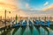 Picturesque view famous gondolas sunrise Venice Italy