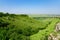 A picturesque view of the green steppe hills, pastures stretching into the distance