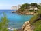 Picturesque view idyllic scenery Benissa rocky coastline. Turquoise water of Mediterranean Sea sunny day