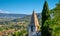 Picturesque view of the landscape and village church spire at Crestet, France.