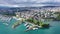 Picturesque view of Lausanne city on shore of Lake Geneva on background of mountains on summer day, Switzerland