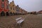 Picturesque view of medieval square in Telc. Fountain with statue of st. Margaret, Plague Column