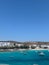 Picturesque view of multiple boats docked near beach houses