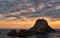 Picturesque view of the mysterious island of Es Vedra at sunset