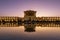 Picturesque view of Naqsh-e Jahan Square with a reflection on a purple sky background