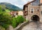 Picturesque view on street with old houses in Potes, Cantabria, Spain