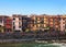 The picturesque views of the houses facades near the Adige river bank, Verona, Italy