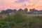 Picturesque village field against fantastic sunset