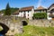 Picturesque village of Ochagavia with three-stored houses and stone bridge