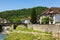 Picturesque village of Ochagavia with three-stored houses and stone bridge