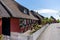 Picturesque village street with colorful Danish houses in Nordby on Fano Island