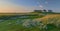 Picturesque village and unique natural landscape of the North Sea Coast on small island of the coast `hallig` at North Frisia, Sch