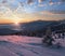 Picturesque winter alps sunrise. Highest ridge of the Ukrainian Carpathians is Chornohora with peaks of Hoverla and Petros