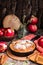 Pie with apples filling in a iron pan