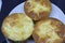 Pie with chesee on a white plate. Sponge cake with black background.