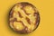Pie on yellow background