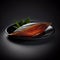 Piece of appetizing tasty smoked fish isolated on black closeup