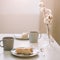 Piece of apple pie on plate with cup of coffee. Breakfast with coffee and cake in cafe. Food photography Table top photo