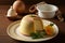 a piece of cake on a plate next to a bowl of eggs and a vase of flowers on a table with a brown table cloth