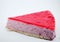 Piece of cake on white background. Cheesecake with raspberry jelly